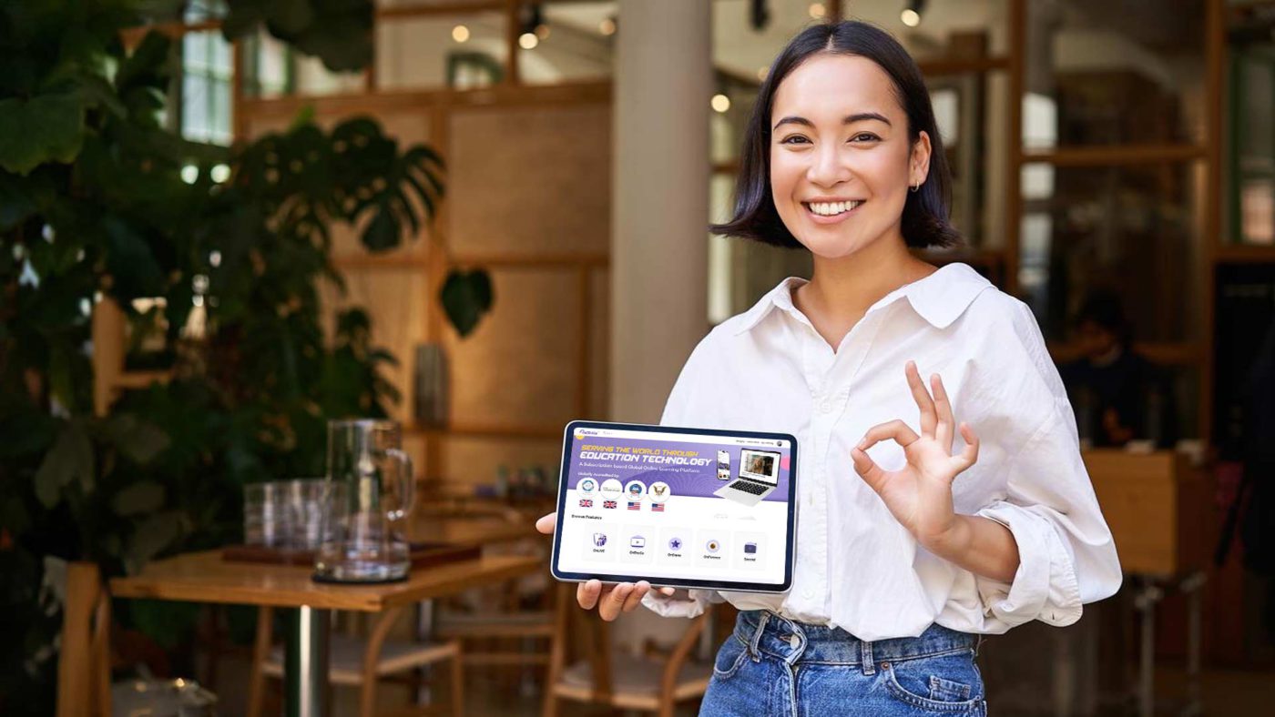 Asian woman shows ReSkills Online Learning Platform on the tablet screen excitingly
